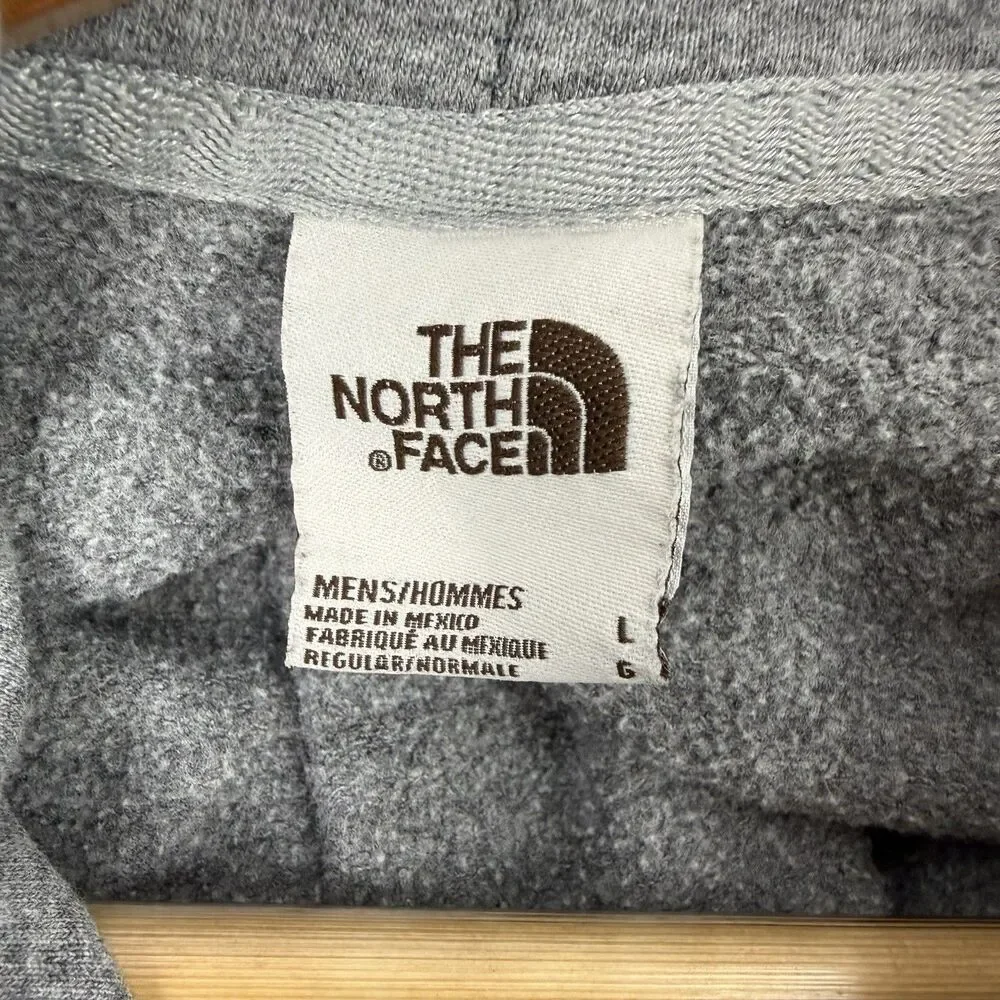 The North Face Gray Pullover Hoodie with White Drawstrings